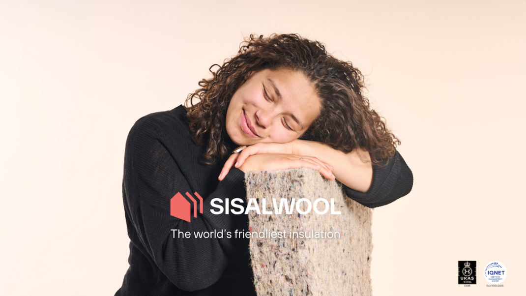 Person resting head on arms over a piece of Sisal Wool insulation with the text "Sisal Wool: The world’s friendliest insulation."